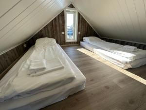 Postel nebo postele na pokoji v ubytování Norsk Havbrukssenter - Rorbuer