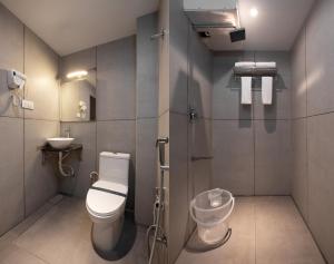 Koupelna v ubytování Grande Inn Trichy