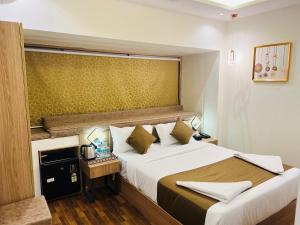 Postel nebo postele na pokoji v ubytování Hotel Larmont Luxury