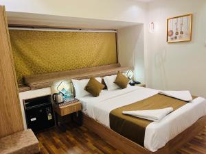 Postel nebo postele na pokoji v ubytování Hotel Larmont Luxury