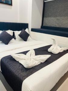 Postel nebo postele na pokoji v ubytování Hotel Larmont Luxury