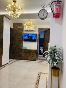 TV a/nebo společenská místnost v ubytování Hotel Larmont Luxury