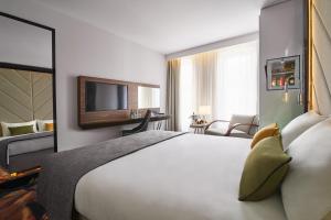 Posteľ alebo postele v izbe v ubytovaní INX Design Hotel