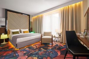 Posteľ alebo postele v izbe v ubytovaní INX Design Hotel