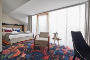 Posteľ alebo postele v izbe v ubytovaní INX Design Hotel + 37 fotografií