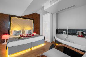 Posteľ alebo postele v izbe v ubytovaní INX Design Hotel