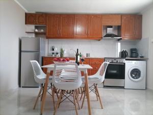 A kitchen or kitchenette at Sunrise Apartment 2 Még 28 kép