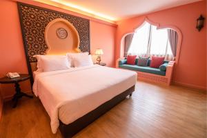 Amman Unique Hotel客房内的一张或多张床位