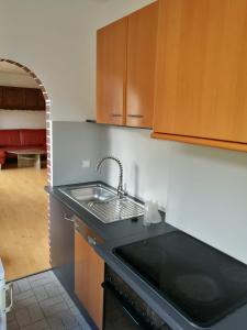 A kitchen or kitchenette at Melker Apartment