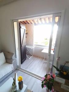 Łóżko lub łóżka w pokoju w obiekcie Magnifique Duplex face à la Mer