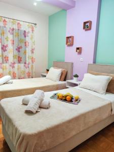 Postel nebo postele na pokoji v ubytování MS Corfu Center Apartment