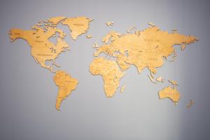 a map of the world in gold at Maya's Flats & Resorts 62 - 3 rooms apartment BASTION WALOWA Gdańsk in Gdańsk