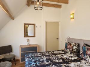 Postel nebo postele na pokoji v ubytování B&B Hoeve Ruimzicht