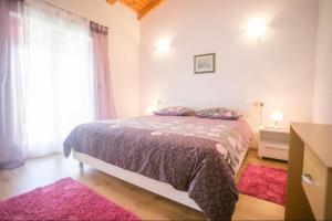 Posteľ alebo postele v izbe v ubytovaní Villa Nevena in Buići Poreč for max 10 Persons 6km from the beach + 36 fotografií