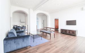 a living room with a couch and a table at Casa Andrea in Menaggio