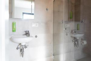 Koupelna v ubytování NürbLife Hotel