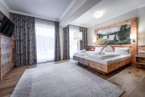 Postel nebo postele na pokoji v ubytování Hotel Kornock