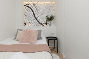 Posteľ alebo postele v izbe v ubytovaní Warsaw City Center Apartments by Noclegi Renters
