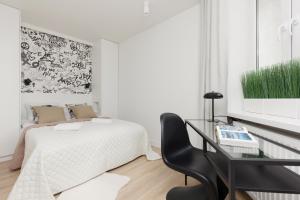 Posteľ alebo postele v izbe v ubytovaní Warsaw City Center Apartments by Noclegi Renters