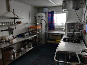 Kuchyň nebo kuchyňský kout v ubytování Askja Hostel