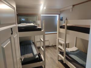 Postel nebo postele na pokoji v ubytování Askja Hostel