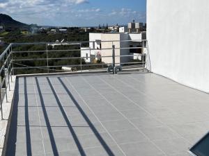 A balcony or terrace at Helios Stays - Sisi Private Apartments