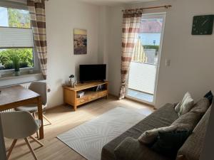 Et tv og/eller underholdning på Ferienwohnung Sonnenschein