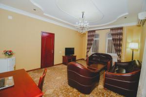TV a/nebo společenská místnost v ubytování Khujand Deluxe Hotel