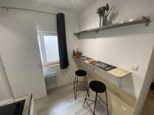 Kuchyň nebo kuchyňský kout v ubytování L'Arène - T1bis refait à neuf à deux pas du métro