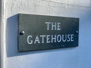 a sign on a wall that reads the cafeteria at Stunning 4-bed Grade II house in the Lake District in Wigton