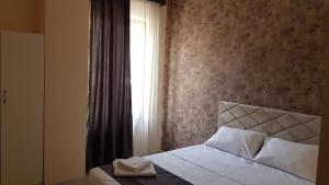 Voodi või voodid majutusasutuse RP HOTEL (NEW) toas