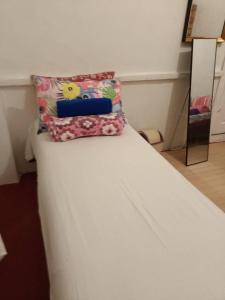 Ένα ή περισσότερα κρεβάτια σε δωμάτιο στο Maraño's Home