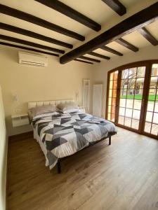 Een bed of bedden in een kamer bij Corte Ca' Bosco