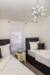 Ένα ή περισσότερα κρεβάτια σε δωμάτιο στο Apartments Zdeslav +63 φωτογραφίες