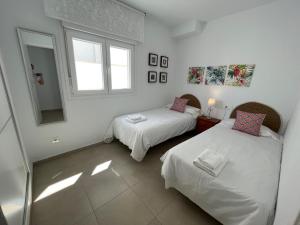 Posteľ alebo postele v izbe v ubytovaní Nerja Paradise Rentals - Villa Zafiro