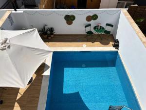 Bazén v ubytovaní Nerja Paradise Rentals - Villa Zafiro alebo v jeho blízkosti