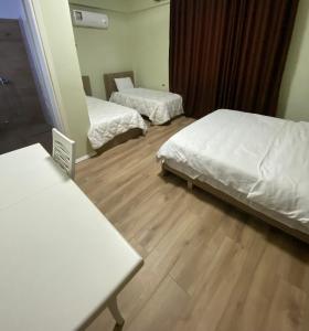 Katil atau katil-katil dalam bilik di Villa Elear