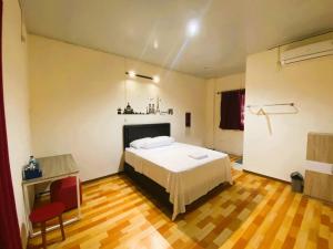 Voodi või voodid majutusasutuse IVI Hotel toas