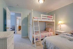 A bed or beds in a room at Manistee Retreat about 30 Mi to Crystal Mountain!