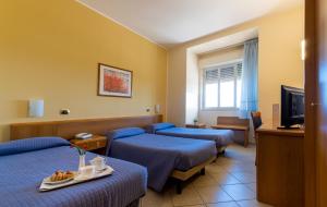 TV a/nebo společenská místnost v ubytování Hotel Relax