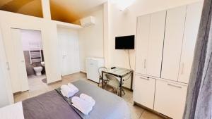 Telewizja i/lub zestaw kina domowego w obiekcie Piccole suite di charme