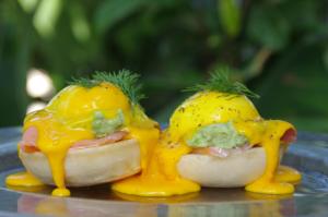 two hot dogs are covered in cheese and mustard at Surfescape Fuerteventura in Lajares