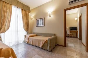 Postel nebo postele na pokoji v ubytování Hotel Relax