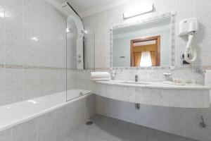 Koupelna v ubytování Hotel Relax