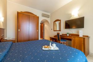 Postel nebo postele na pokoji v ubytování Hotel Relax