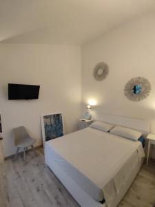 Postel nebo postele na pokoji v ubytování Le Antiche Mura - Sarnico -