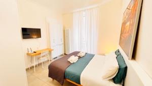 Telewizja i/lub zestaw kina domowego w obiekcie Piccole suite di charme