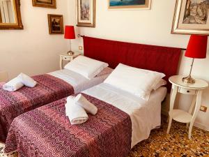 Cama o camas de una habitación en Grimaldi Apartments Cannaregio