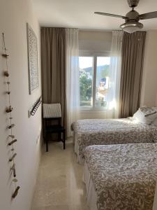 Letto o letti in una camera di Manilva Playa 15C