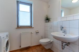 Ένα μπάνιο στο Dünenhus Appartement Dünenhus +19 φωτογραφίες